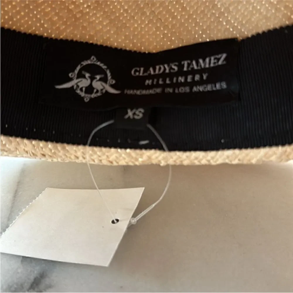 Gladys Tamez straw hat